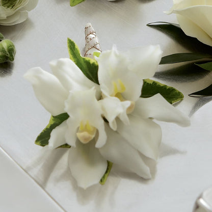 White Mini Cymbidium Boutonniere –  Colonial Floral Fascinations, Georgetown SC